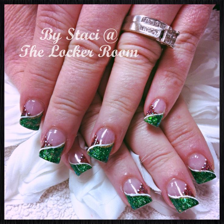 Festive Glittery Green French Tips with Elegant White Stripes and Gold Accents.