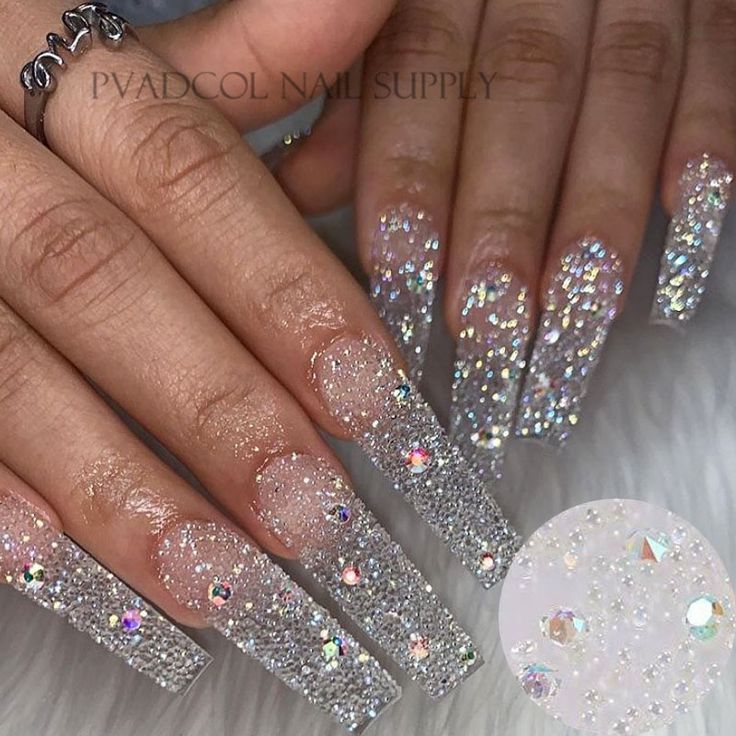 Elegant Glittery Long Square Acrylic Nail Design Adorned with Sparkling Rhinestones.