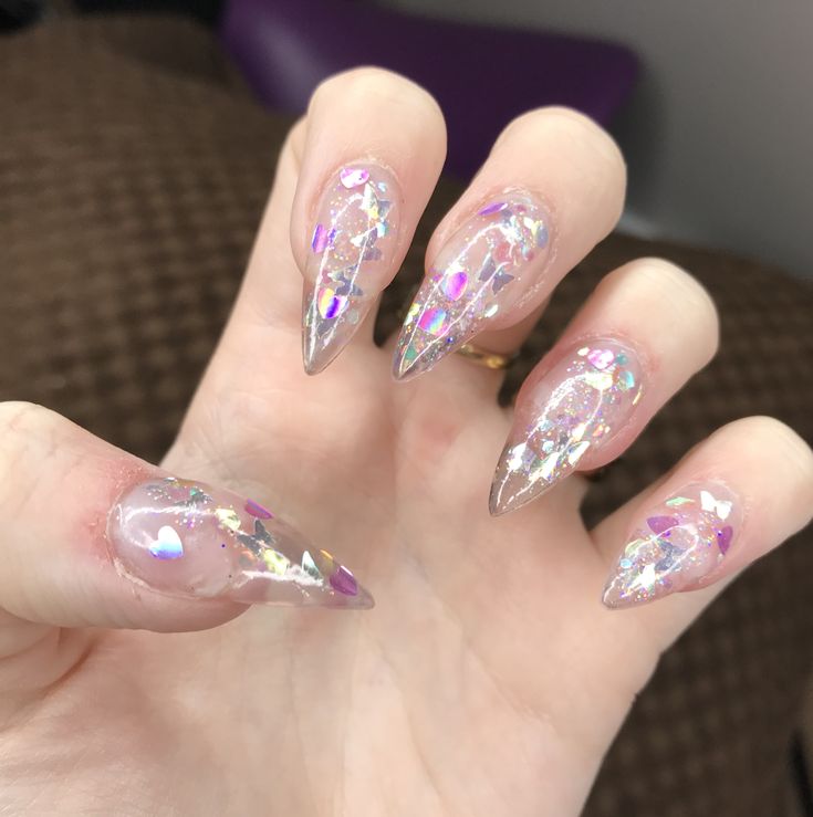 Chic Stiletto Nail Design with Holographic Glitter and Heart Confetti