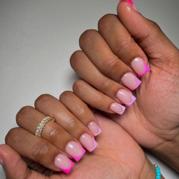 Elegant Chic Pink Nail Design: Playful Fusion of Classic French Tips and Modern Aesthetics