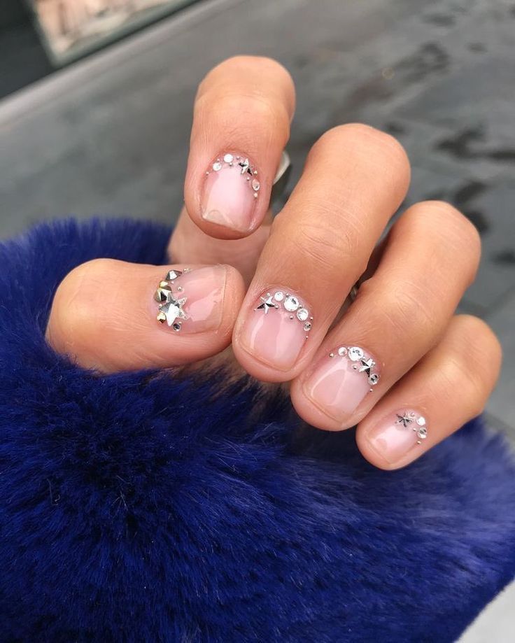 Elegant Nude Nail Design with Delicate Silver Rhinestone Embellishments