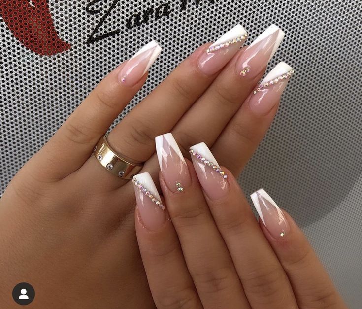 Chic Almond Ombre Nail Design with Rhinestone Accents for Any Occasion.