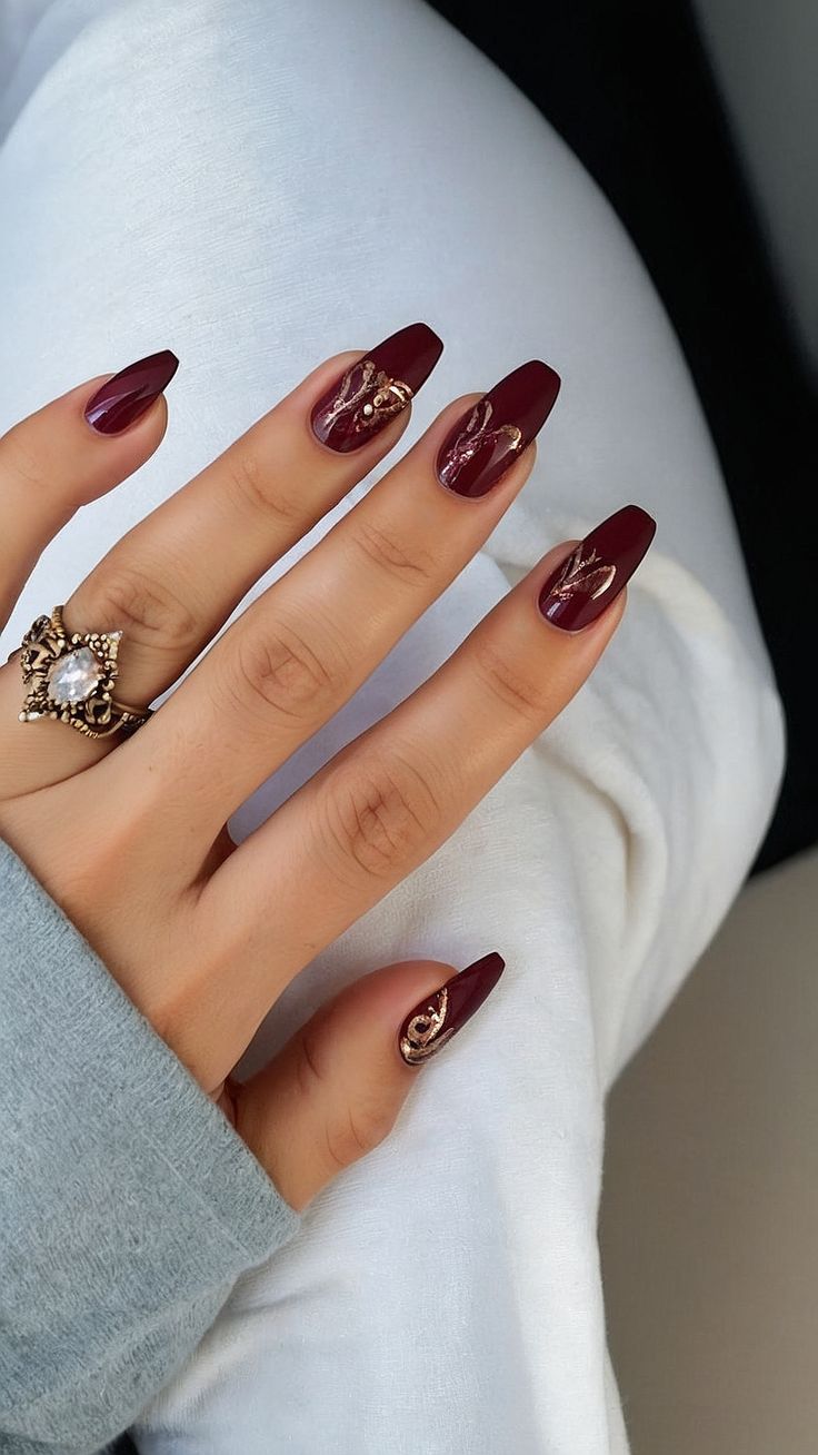 Elegant Burgundy Nails: A Striking Blend of Sophistication and Glamour for Any Occasion.