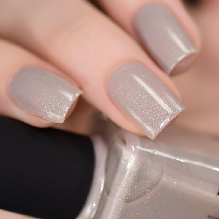 Sophisticated Nude Nail Design with Shimmering Grayish-Beige Polish for Any Occasion.