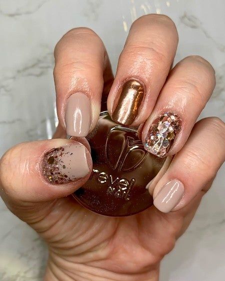 Elegant Chic Nail Design: Neutral Tones with Metallic Accents