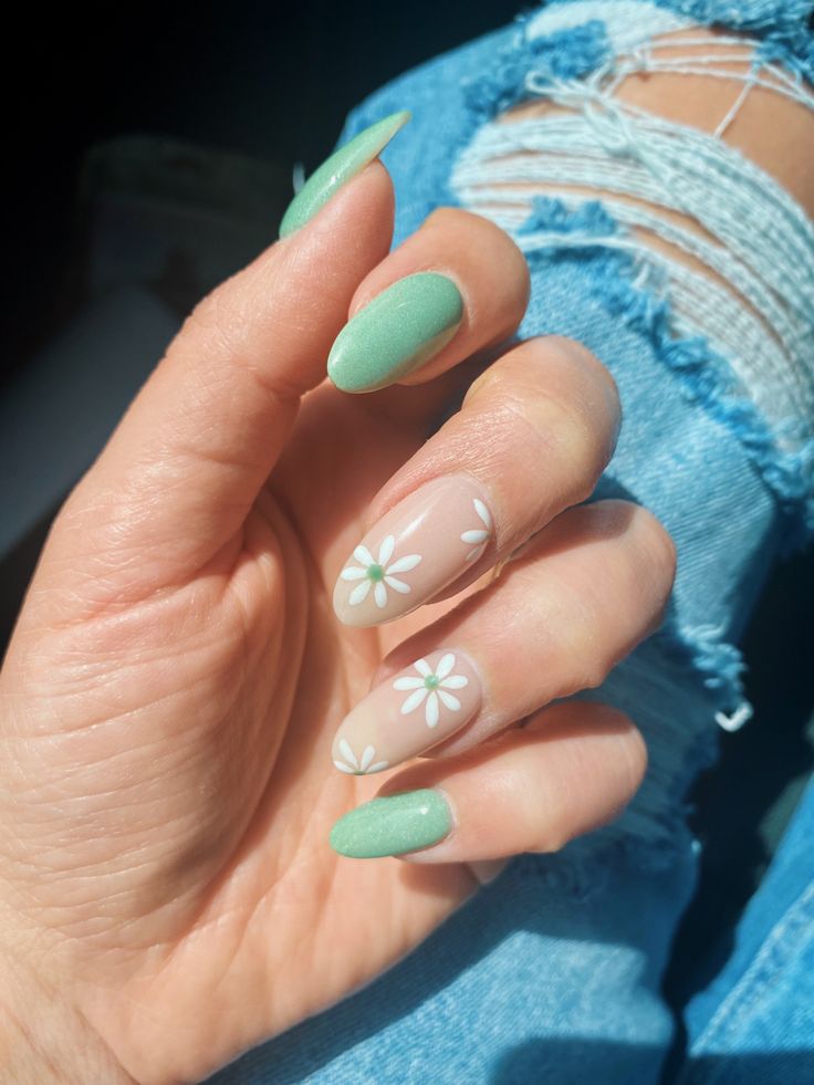 Elegant Mint Green Nail Design with Floral Accents for Any Occasion