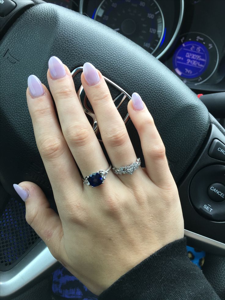 Elegant Lavender Nails: A Glossy Touch of Sophistication.