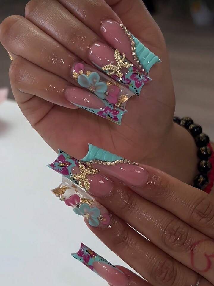 Elegant Long Nails with Intricate Floral Designs and Vibrant Pastel Colors.