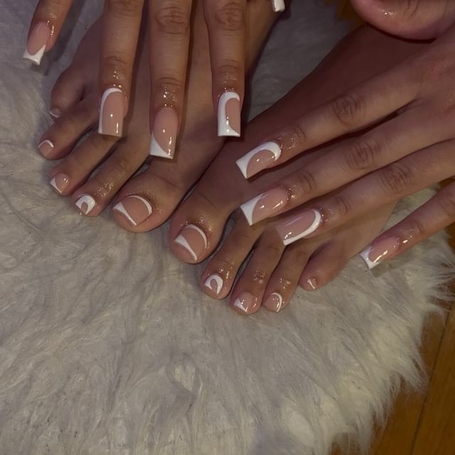 Elegant Neutral Nail Design with Delicate Accents for Any Occasion