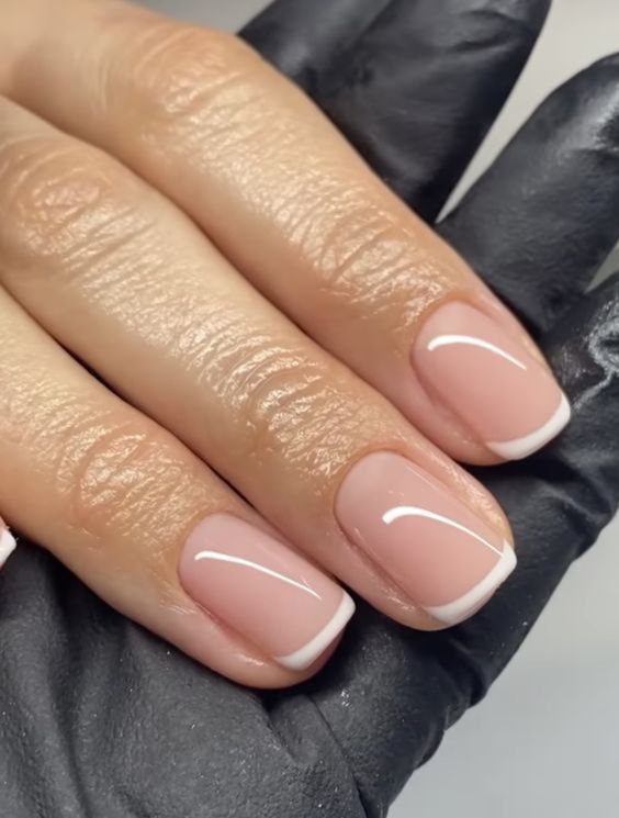 Sophisticated French Manicure with Modern Accents for Any Occasion.