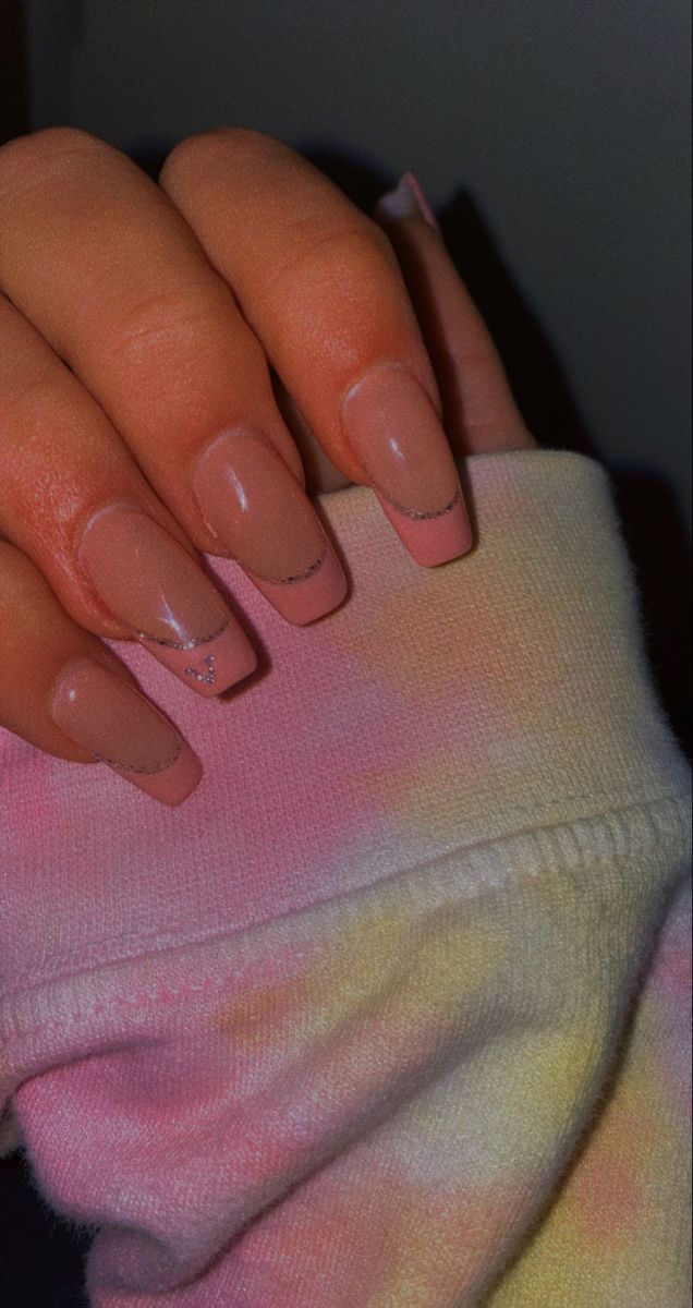 Chic Nude Nails with French Tip and Sparkle Paired with Pastel Tie-Dye Sweatshirt.