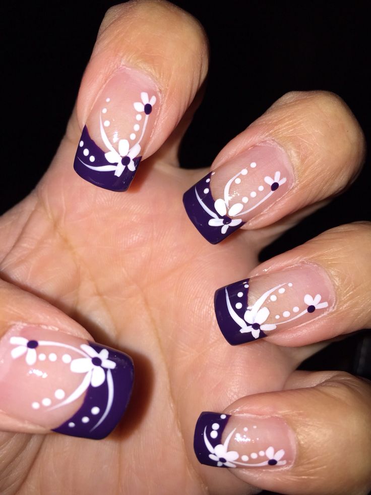 Sophisticated Floral Nail Design with Deep Purple Tips and Delicate Daisies.