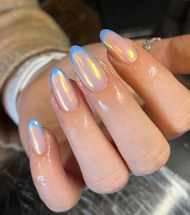 Chic Almond Shaped Nail Design with Iridescent Base and Baby Blue French Tip.