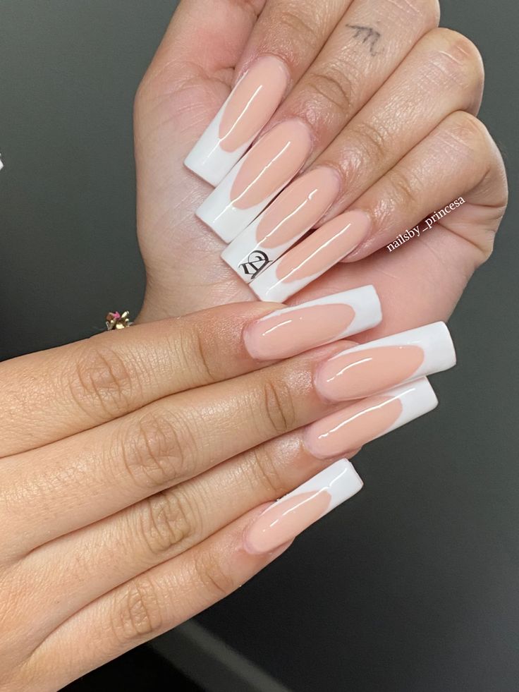 Chic Minimalist Nail Design: Soft Nude and Crisp White Elegance