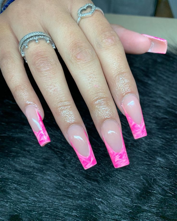 Vibrant Swirled Pink Nail Design on Long Rectangular Nails for a Bold Statement.