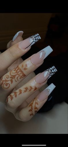 Elegant Tapered Nail Design with Nude and White Tips Enhanced by Intricate Henna and Geometric Art