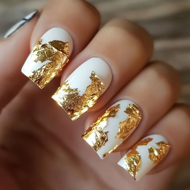 Chic White Nail Design Accented with Luxurious Gold Foil.