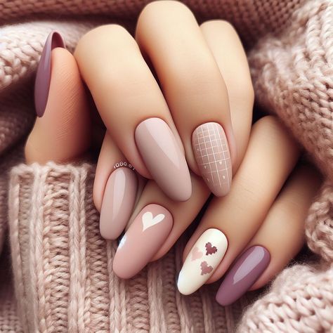 Elegant Mauve and Nude Nail Design with Playful Patterns and Matte Finishes.