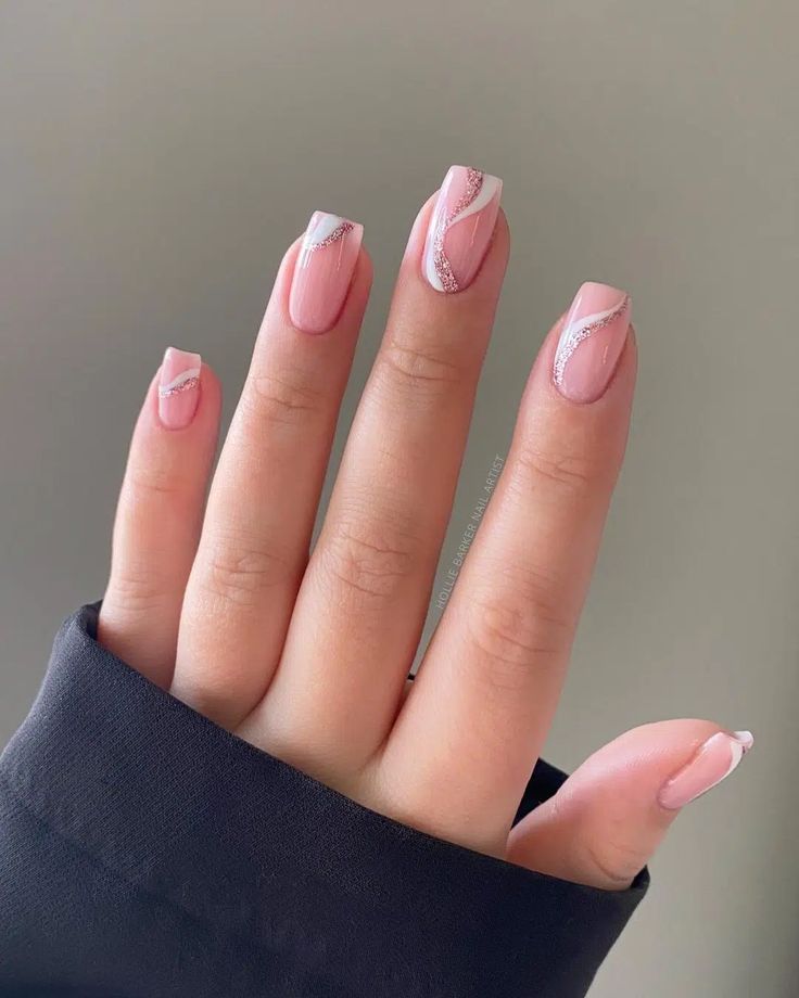 Sophisticated Soft Pink Nail Art with Elegant White and Silver Accents.