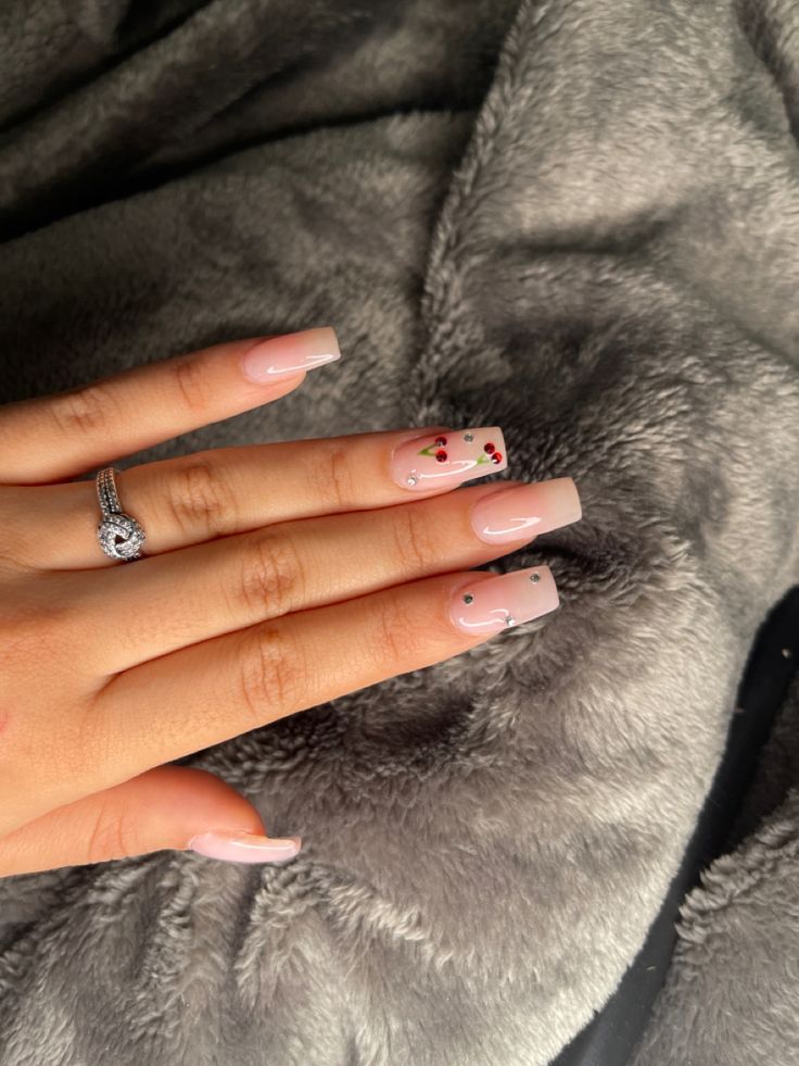 Charming Soft Pink Nail Design with Elegant Square Tips and Floral Accents