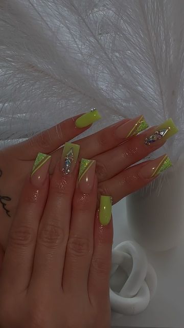 Fresh and Glamorous Pastel Yellow and Neon Green Nail Design with Geometric Patterns and Sparkling Accents