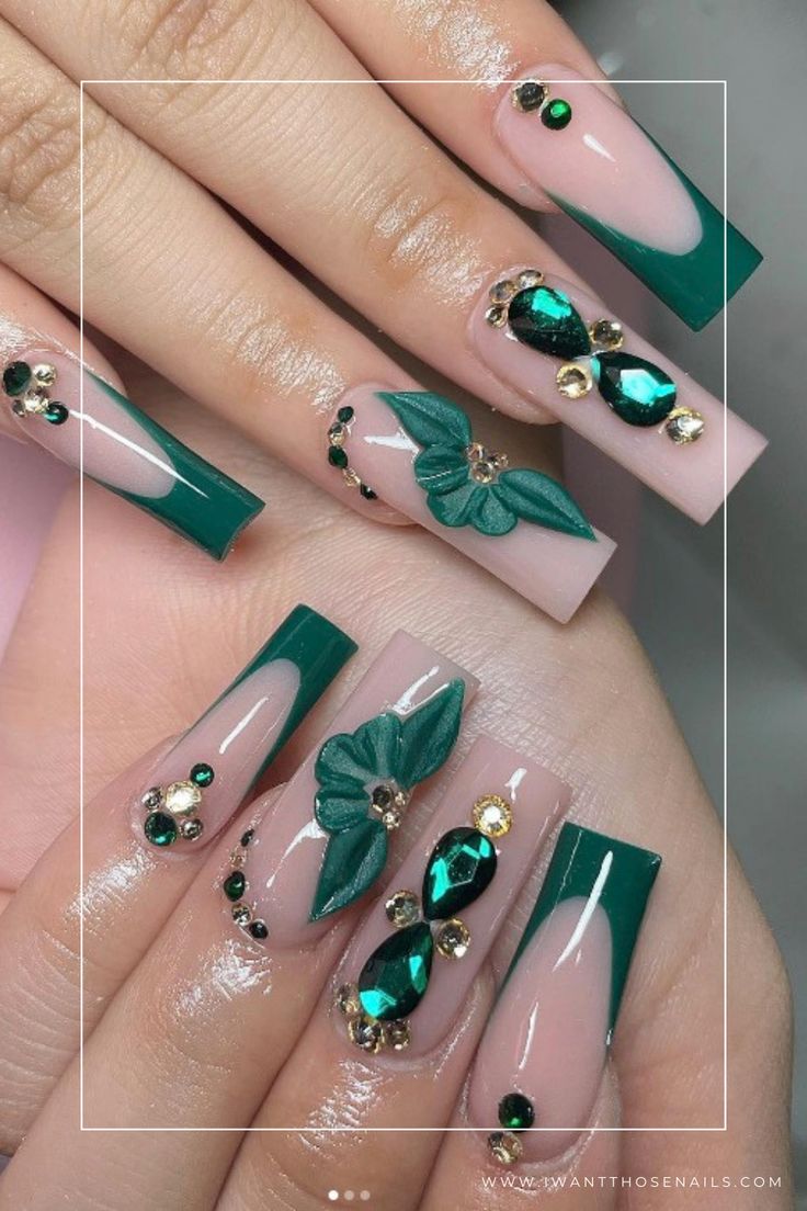 Sophisticated Almond-Shaped Nail Design with Green and Nude Shades, 3D Florals, and Rhinestone Embellishments.