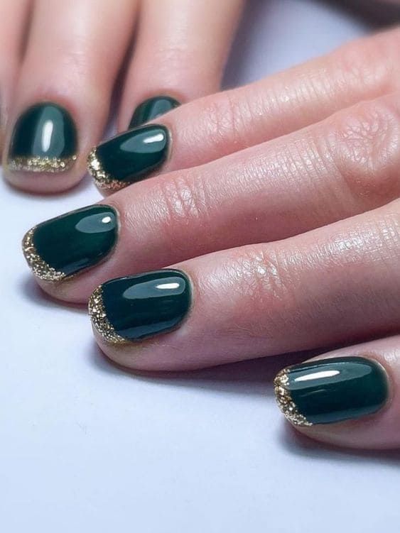 Sophisticated Glossy Emerald Green Nails with Gold Tips.