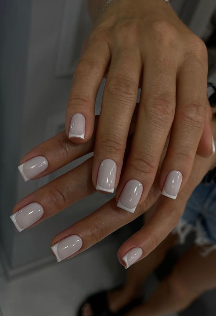 Timeless Nude and White French-Inspired Nail Design for Any Occasion