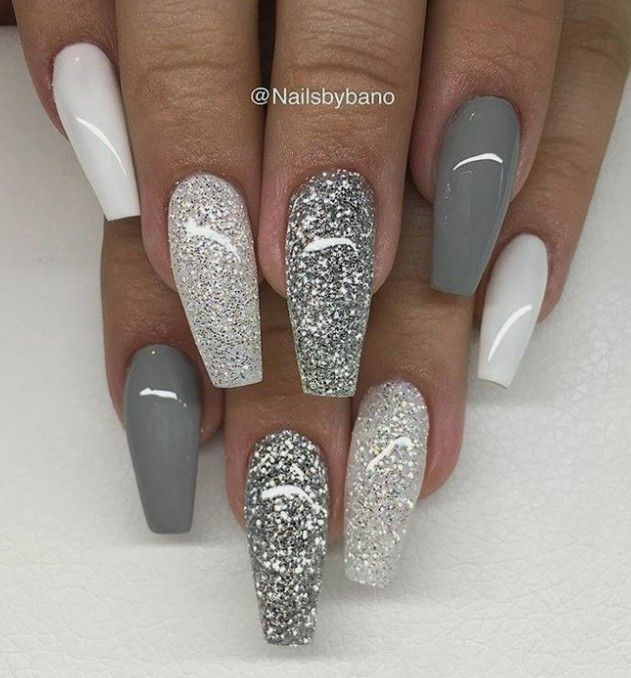 Modern Chic Nail Design: Glossy Gray, Vibrant White, and Shimmering Glitter Accents