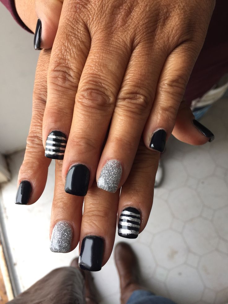 Bold Black and Silver Striped Nail Design for Every Occasion