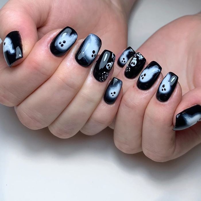 Spooky Whimsical Gradient Nail Design: Black and Grey with Ghost Motifs