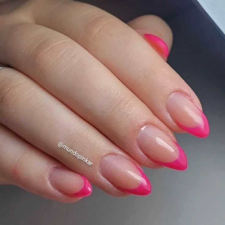 Elegant Pink French Tip Nails with a Modern Twist for a Glamorous Look.