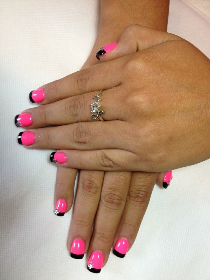 Bold Pink and Black Nail Art with Glamorous Rhinestone Accents.