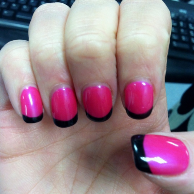 Chic Pink and Black French Tip Nail Design for a Bold and Stylish Look.