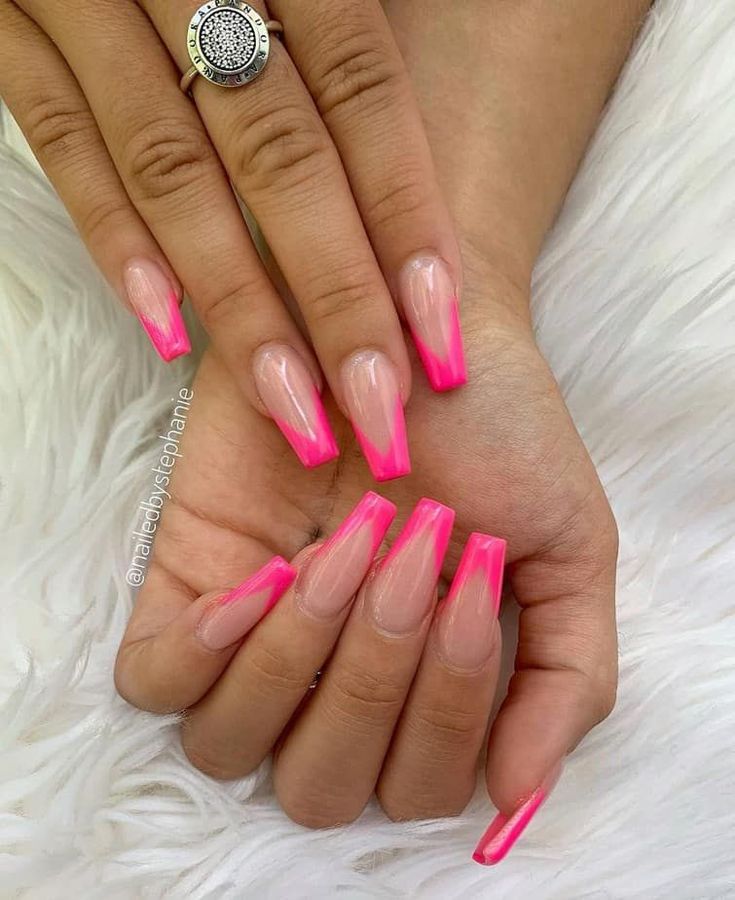 Striking Gradient Pink French Tip Nails with Elegant Accents.