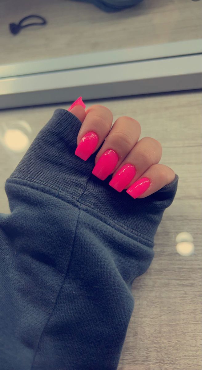 Bold Neon Pink Nails for a Chic and Casual Vibe.