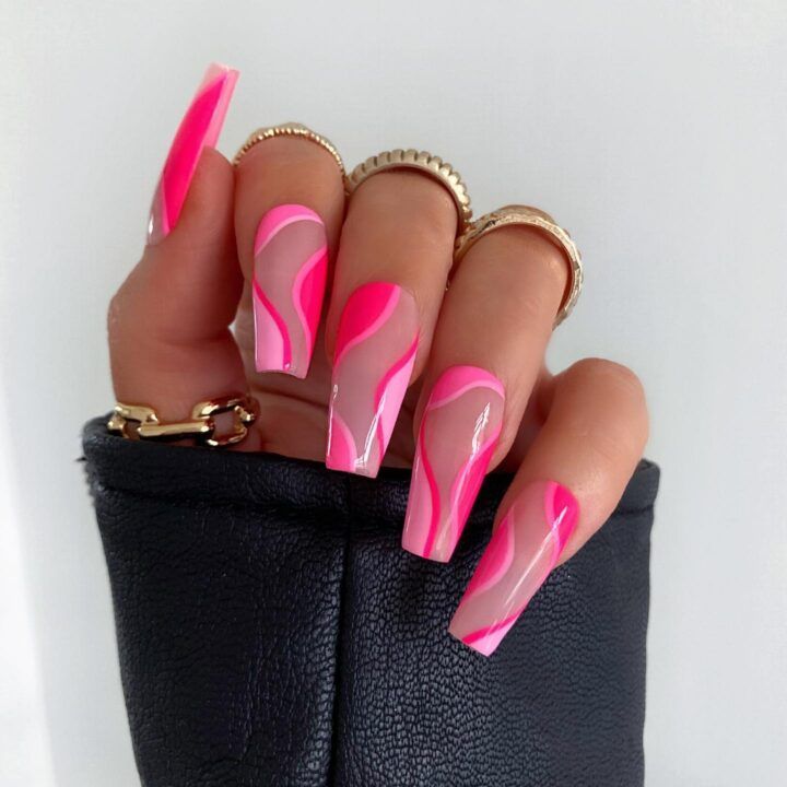 Bold Pink Wave Nail Design with Glossy Finish and Chic Ring Pairing