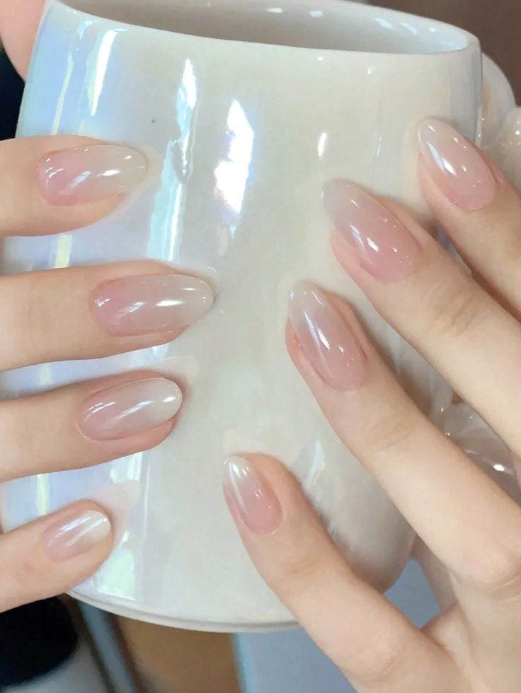 Chic Almond-Shaped Nails with Sophisticated Ombre Finish