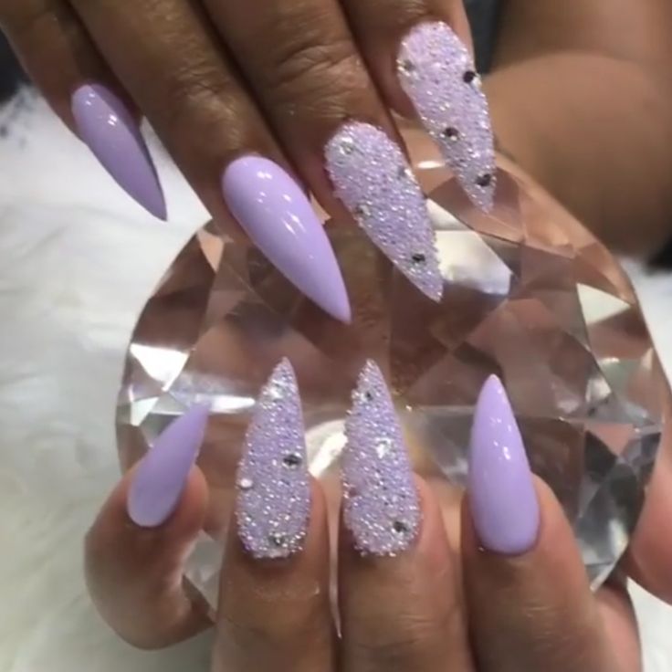 Elegant Lavender Almond-Shaped Nail Design with Glossy Finish and Sparkly Accents