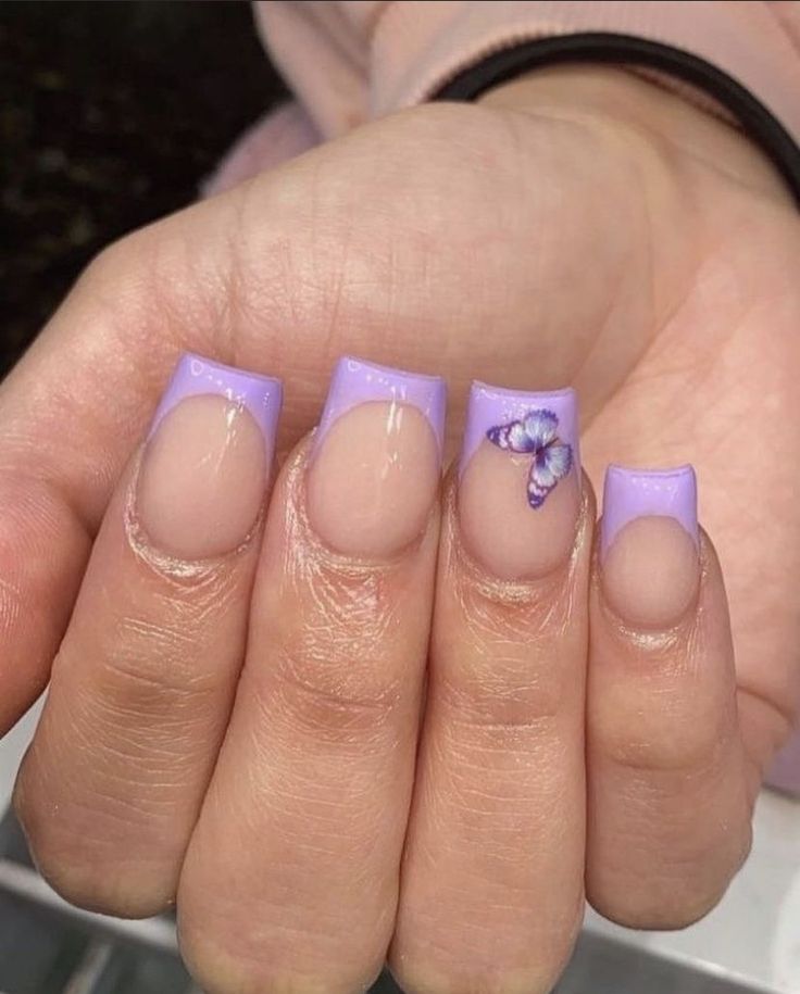 Elegant Lavender French Tip Nail Design with Whimsical Butterfly Accent.