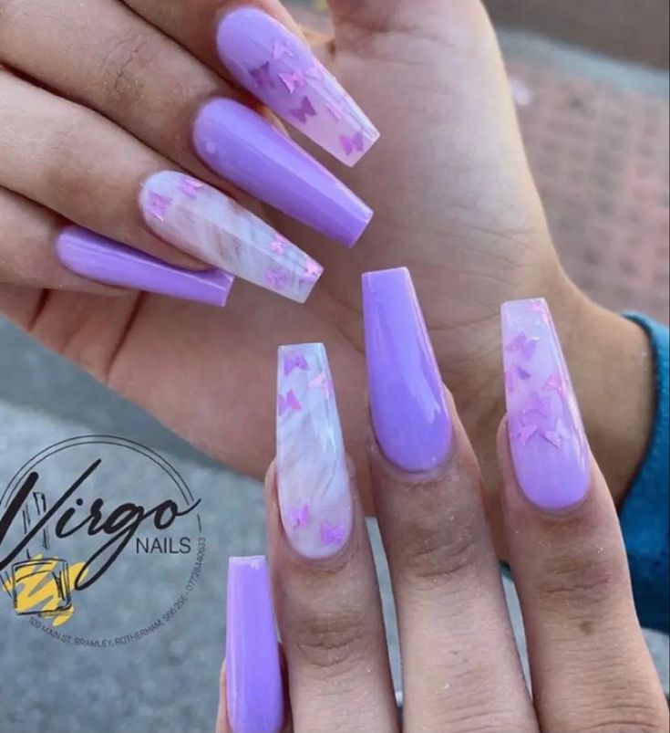 Intricate Glossy Lavender Nail Design with Marble and Pastel Pink Accents.