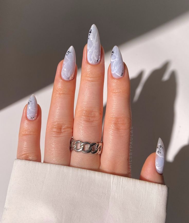 Sophisticated Lavender Gradient Pointed Nails with Intricate Silvery Accents.