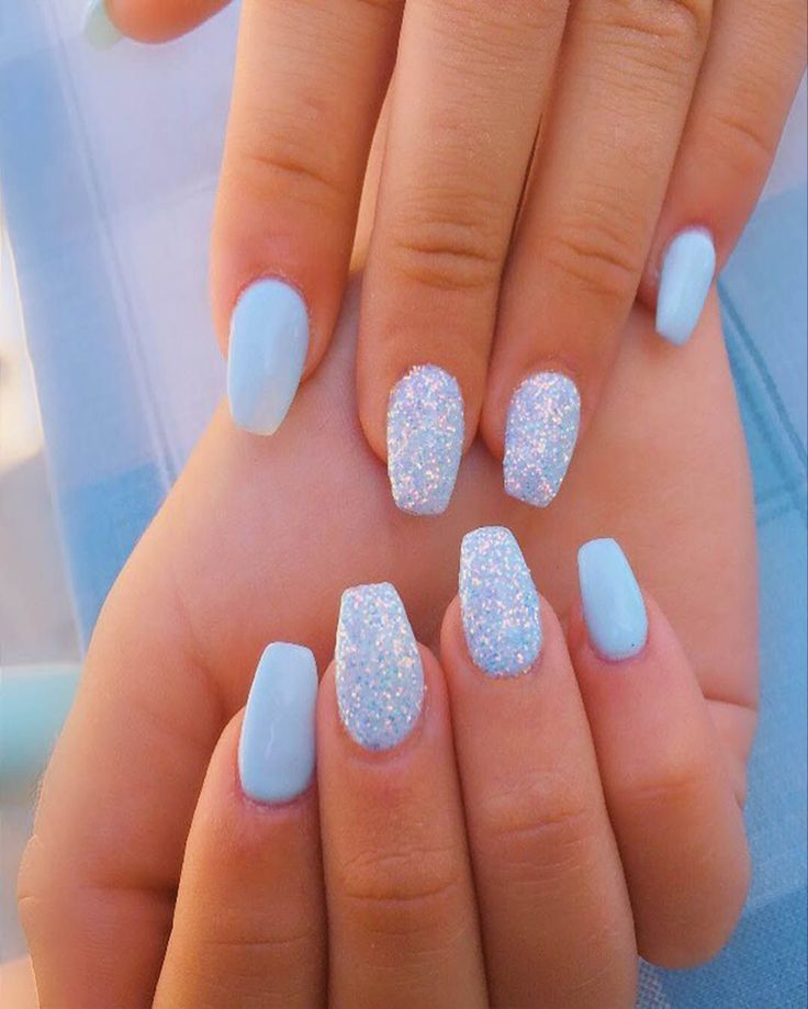 Elegant Light Blue Nail Design with Glitter for a Playful Summer Look