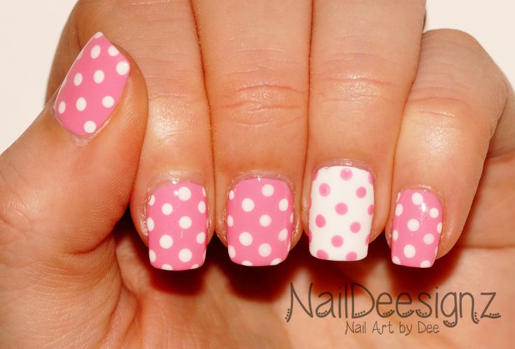 Vibrant Pink Polka Dot Nail Design: Whimsical Patterns for a Cheerful Touch.