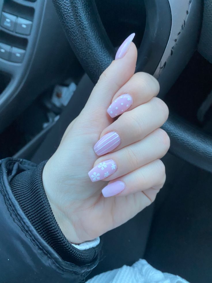 Charming Feminine Aesthetic: Delicate Pastel Nail Art with Playful Designs