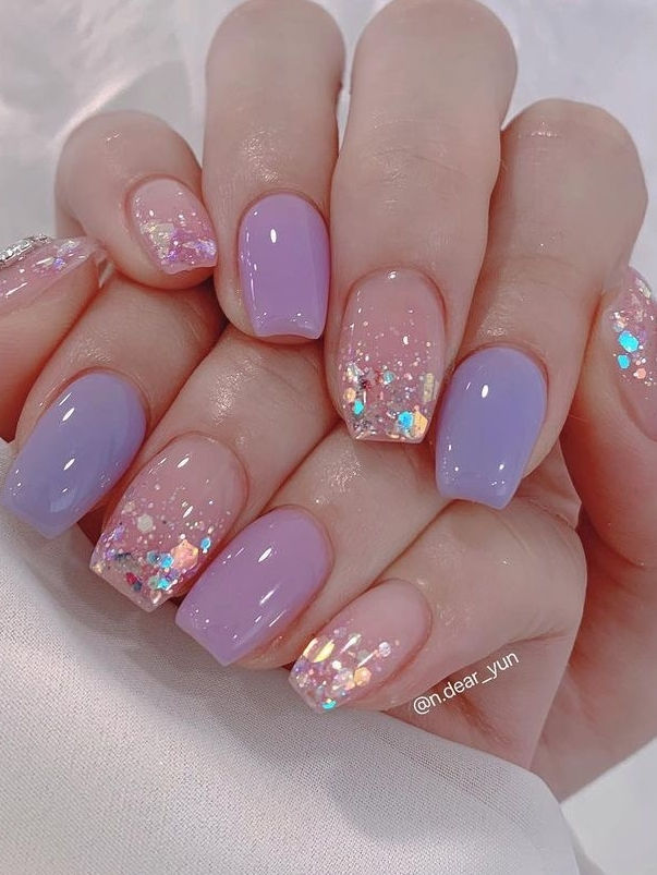 Elegant Lavender and Pastel Pink Gradient Nail Design with Glitter Accents