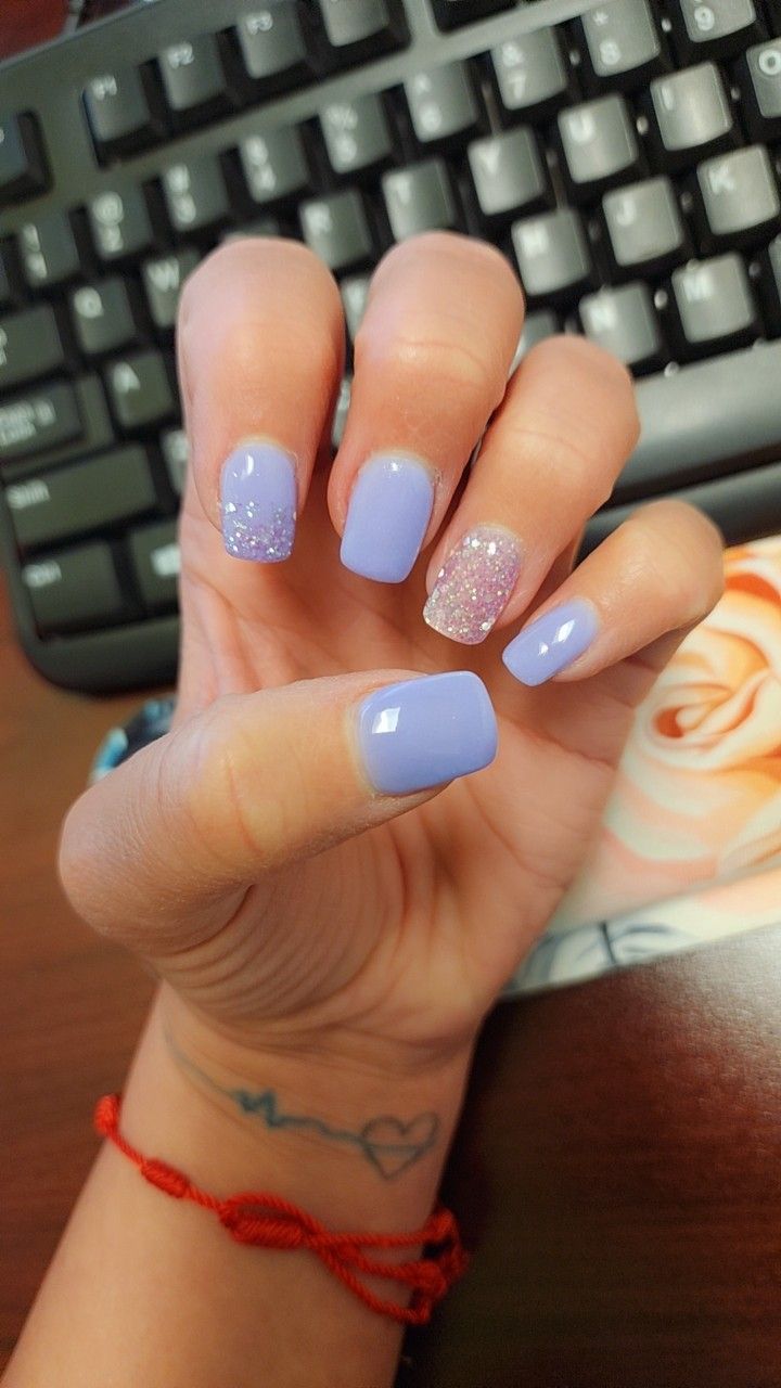 Chic Lavender Nail Design: Glossy and Glittery Finishes for Everyday Elegance.