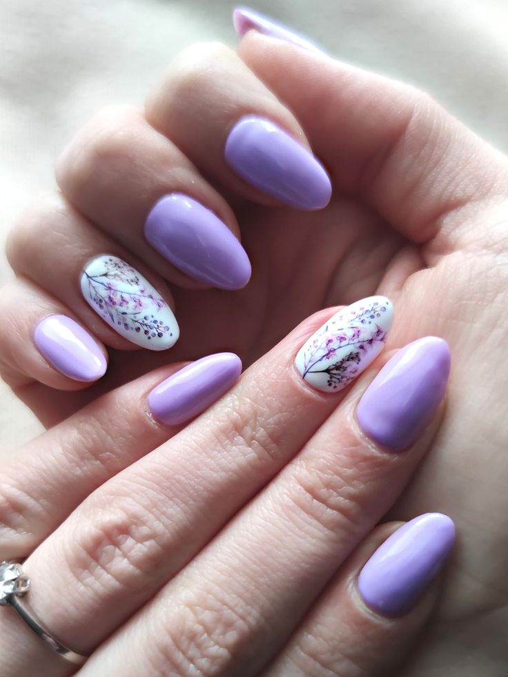 Sophisticated Lavender Nail Design with Floral Accents and Artistic Details