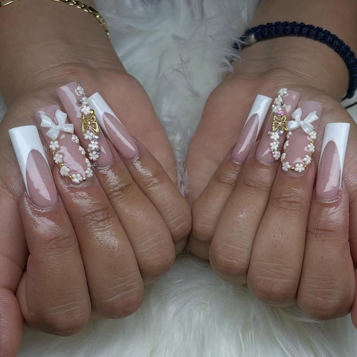 Sophisticated Long Square Nail Design with Nude and White Polish, Pearls, and Bows.