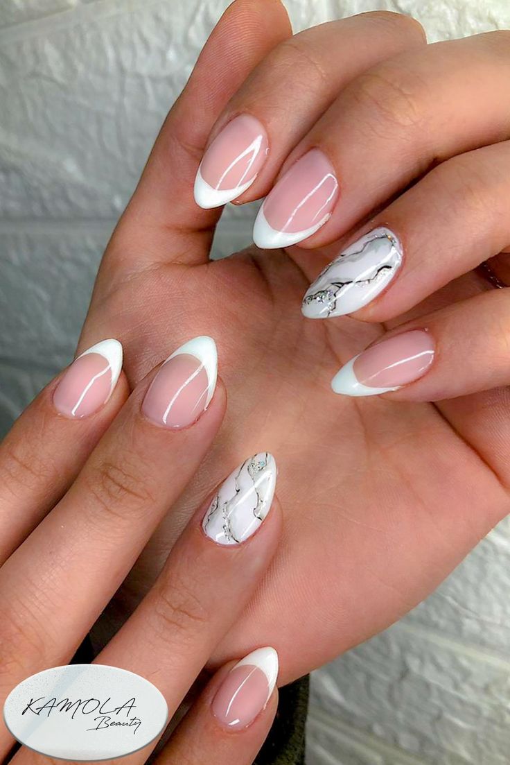 Sophisticated Soft Pink and White French Tip Nail Design with Chic Marble Accent.